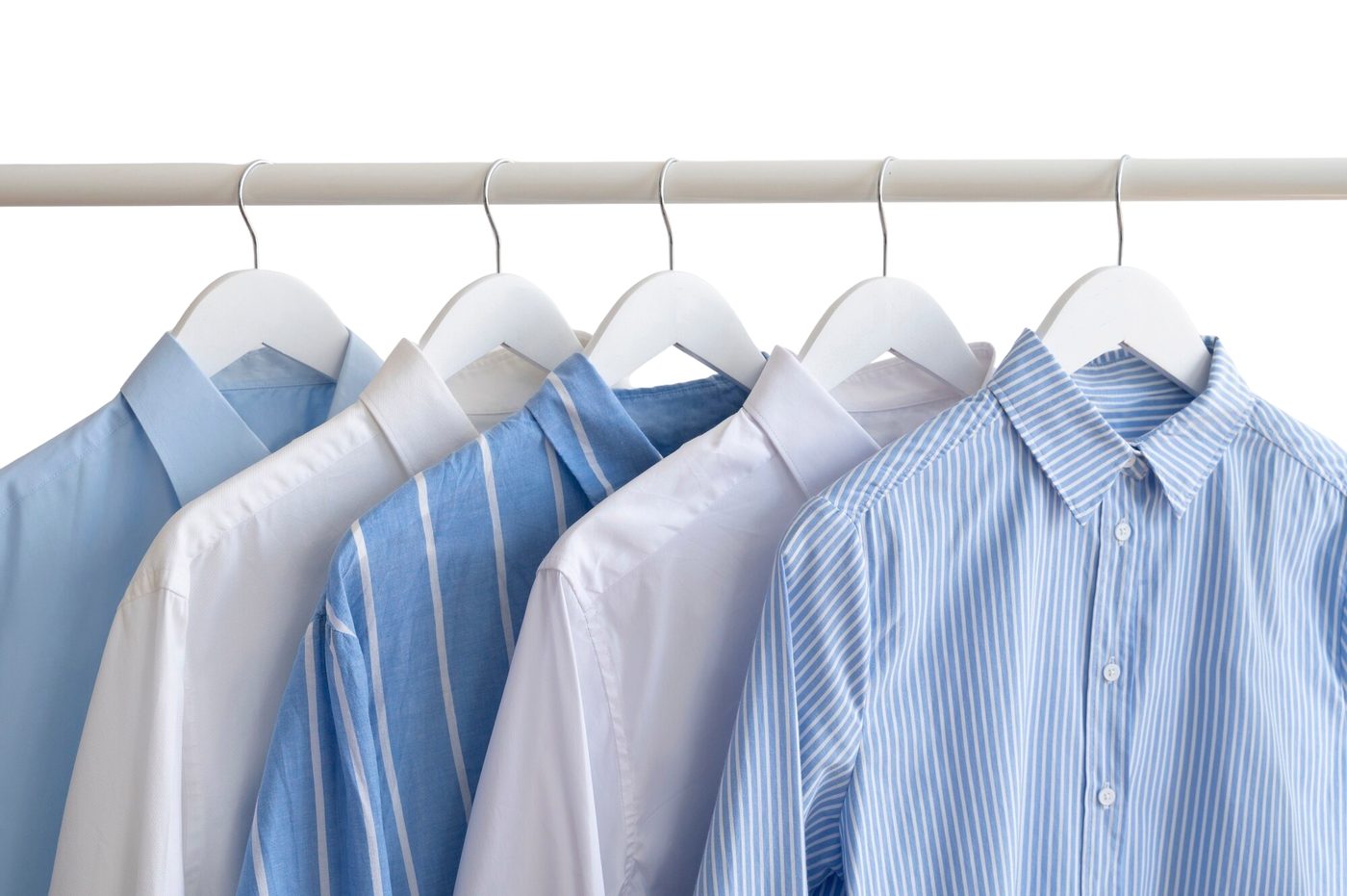 Freshly dry-cleaned and pressed shirts on hangers